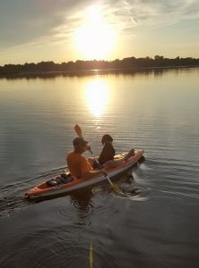 Lucy the Labradoodle and David in a kayak